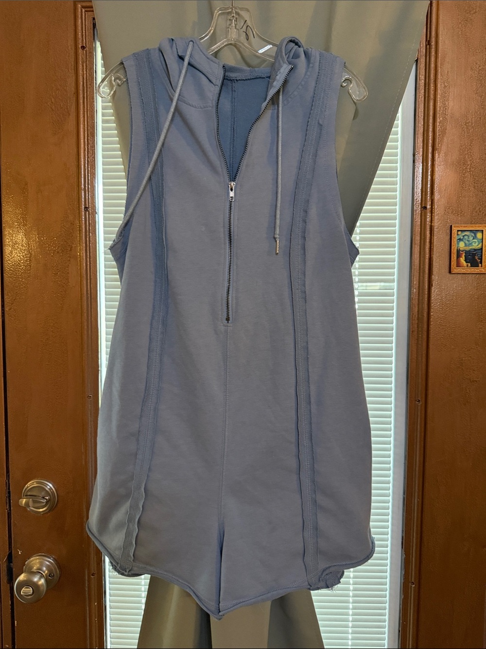 Sleeveless romper size large.